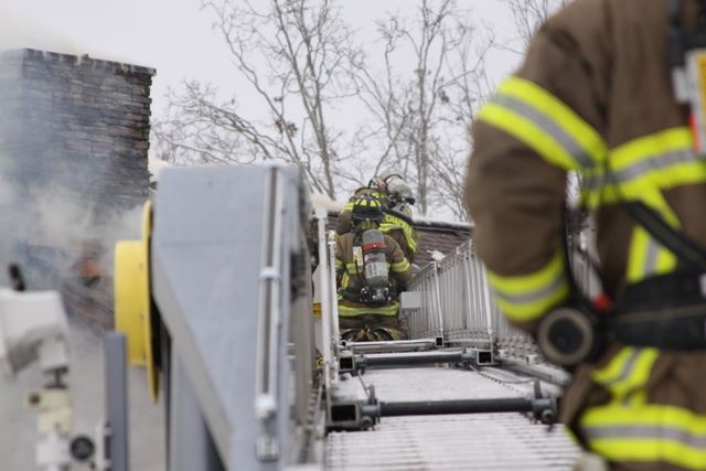 Firefighters putting out a fire at Camp Marymount Fire in 2011.