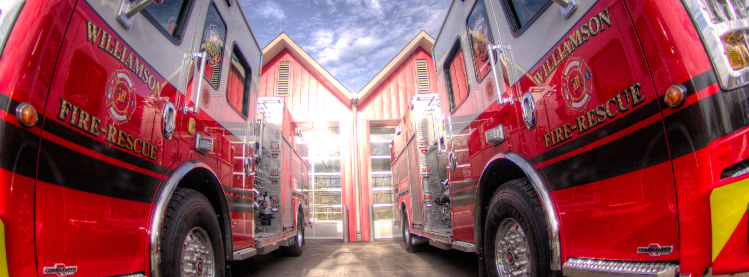 Close-up of two fire engines.